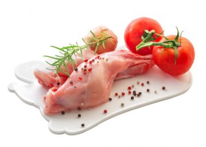 Raw rabbit meat with vegetables